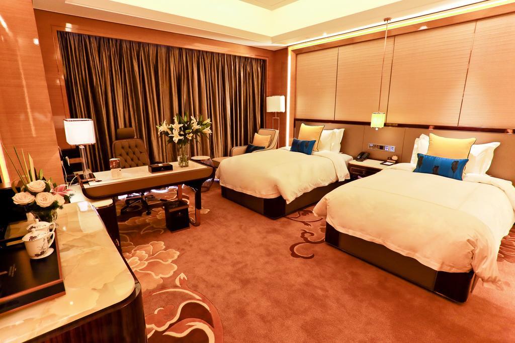 Jinjiang International Hotel Урумки Стая снимка
